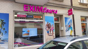 Exim tours - venkovní reklama vč. světelného loga